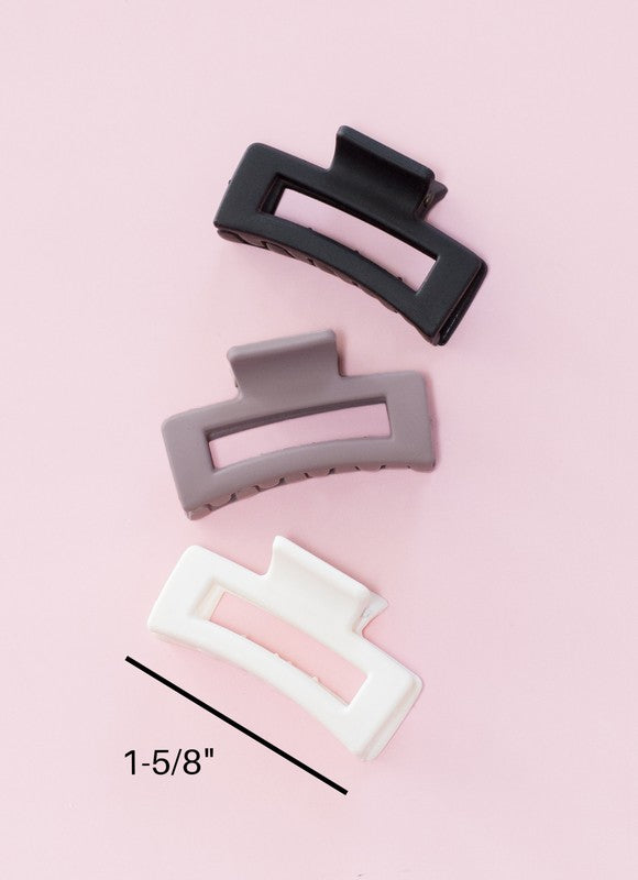 Blonde highlighted hair partially clipped up with a Mini Box Claw Set - 3 Pack.