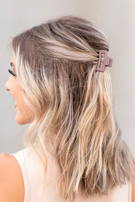 Blonde highlighted hair partially clipped up with a Mini Box Claw Set - 3 Pack.