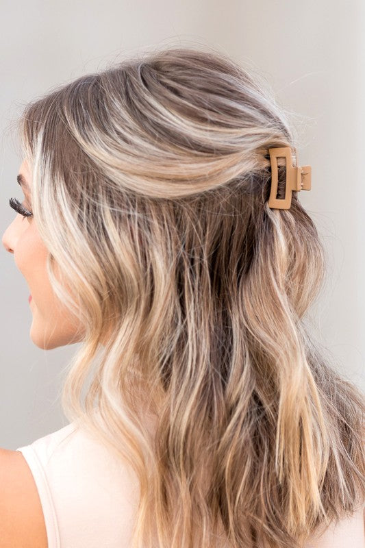 Blonde highlighted hair partially clipped up with a Mini Box Claw Set - 3 Pack.