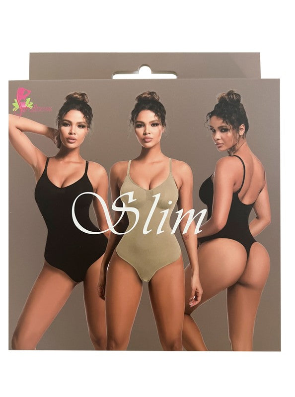 Packaging displaying three women modeling various colors of the Slim Shaper Thongs Seamless Sculpt Bodysuit in black, beige, and another black version. The word "Slim" is prominently highlighted, emphasizing the seamless construction and powerful compression for a flattering silhouette.