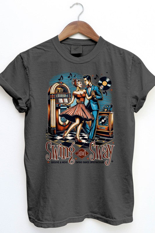 The Swing and Sway, Retro Vintage Garment Dye Tee showcases a classic swing dance scene with a couple dancing near a jukebox, record player, and musical notes. The text reads "Swing and Sway: Groove & Move Swing Dance Spectacular." This unisex graphic tee features a vintage wash for an ideal retro feel.