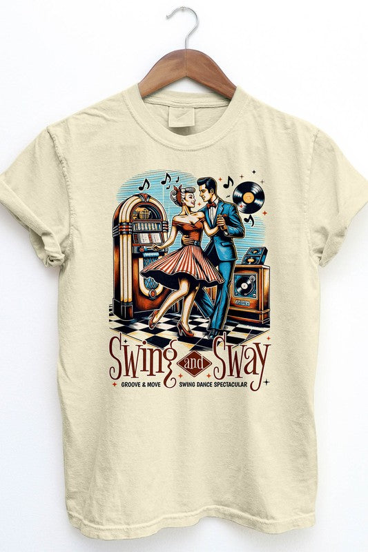 The Swing and Sway, Retro Vintage Garment Dye Tee showcases a classic swing dance scene with a couple dancing near a jukebox, record player, and musical notes. The text reads "Swing and Sway: Groove & Move Swing Dance Spectacular." This unisex graphic tee features a vintage wash for an ideal retro feel.