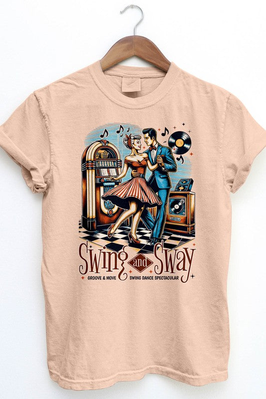 The Swing and Sway, Retro Vintage Garment Dye Tee showcases a classic swing dance scene with a couple dancing near a jukebox, record player, and musical notes. The text reads "Swing and Sway: Groove & Move Swing Dance Spectacular." This unisex graphic tee features a vintage wash for an ideal retro feel.