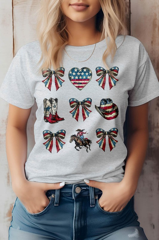 An individual is donning the Cowgirl 4th of July Coquette Western Graphic Tee, a white shirt decorated with patriotic-themed graphics that make it ideal for celebrating the 4th of July. The design showcases hearts, bows, a horse rider, boots, and a hat.