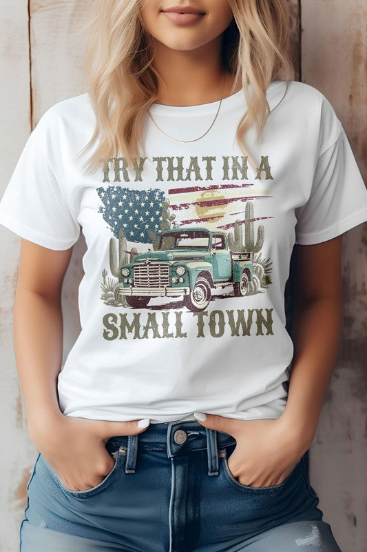 Someone wearing the "Try That in a Small Town Western Graphic Tee," which showcases a vintage truck and cacti design, truly embodies the cowboy spirit and country music charm.