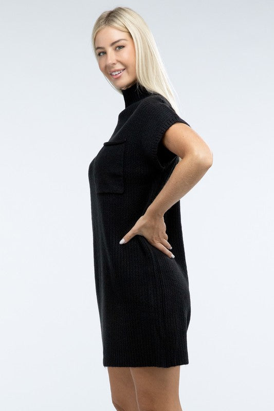 A woman stands wearing a brown Mock Neck Short Sleeve Sweater Dress with a pocket on the left side of the chest, paired with black ankle boots. She is posing against a plain white background.