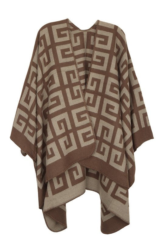 Brown and beige Greek Pattern Poncho showcasing a geometric key design. Perfect for any occasion, this versatile piece drapes elegantly over the bust, waist, and hips.