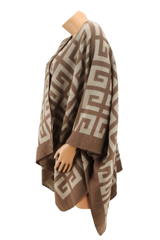 Brown and beige Greek Pattern Poncho showcasing a geometric key design. Perfect for any occasion, this versatile piece drapes elegantly over the bust, waist, and hips.