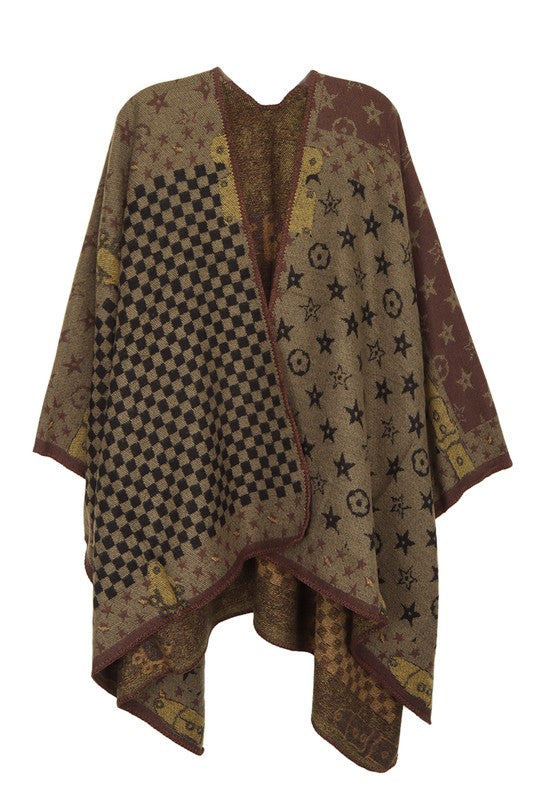 The Geometric Pattern Poncho features a brown color with an eclectic mix of designs, including checks, stars, and abstract shapes, all beautifully draped on a plain background.