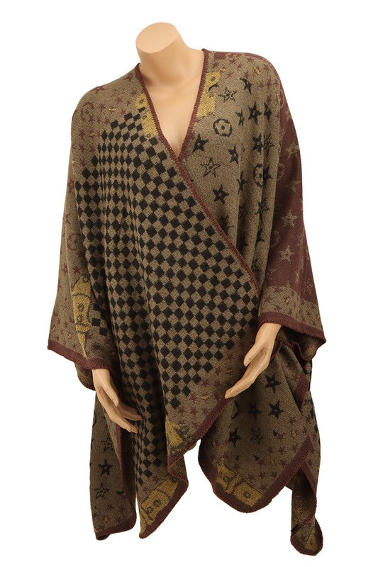 The Geometric Pattern Poncho features a brown color with an eclectic mix of designs, including checks, stars, and abstract shapes, all beautifully draped on a plain background.