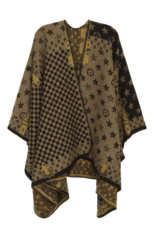 The Geometric Pattern Poncho features a brown color with an eclectic mix of designs, including checks, stars, and abstract shapes, all beautifully draped on a plain background.