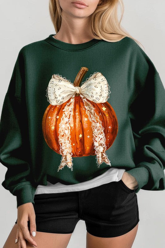 A person wearing the Coquette bow Halloween Pumpkin Fleece Sweatshirt, which features a black unisex crew neck design with a printed Halloween pumpkin graphic adorned with a large, lacy white bow.