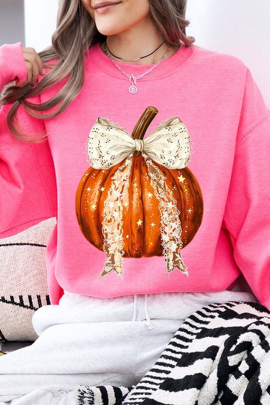 A person wearing the Coquette bow Halloween Pumpkin Fleece Sweatshirt, which features a black unisex crew neck design with a printed Halloween pumpkin graphic adorned with a large, lacy white bow.