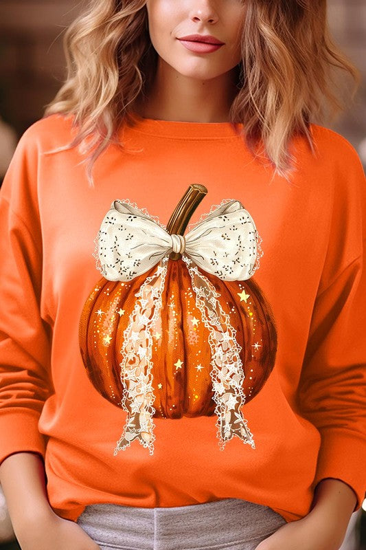 A person wearing the Coquette bow Halloween Pumpkin Fleece Sweatshirt, which features a black unisex crew neck design with a printed Halloween pumpkin graphic adorned with a large, lacy white bow.