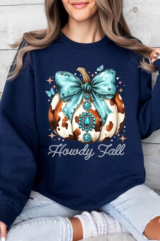 Person wearing a light gray sweatshirt with a decorative pumpkin design featuring a teal bow and the text "Howdy Fall." This stylish piece is part of our Howdy Fall Western Pumpkin Fleece Sweatshirts collection, perfect for anyone looking for unisex crew neck sweaters this season.