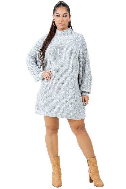 A person models the WOMEN FASHION SWEATER DRESS, a light gray turtleneck sweater dress with long sleeves, paired with tan ankle boots against a plain white background.