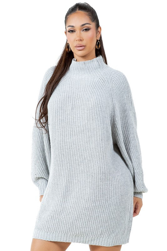 A person models the WOMEN FASHION SWEATER DRESS, a light gray turtleneck sweater dress with long sleeves, paired with tan ankle boots against a plain white background.