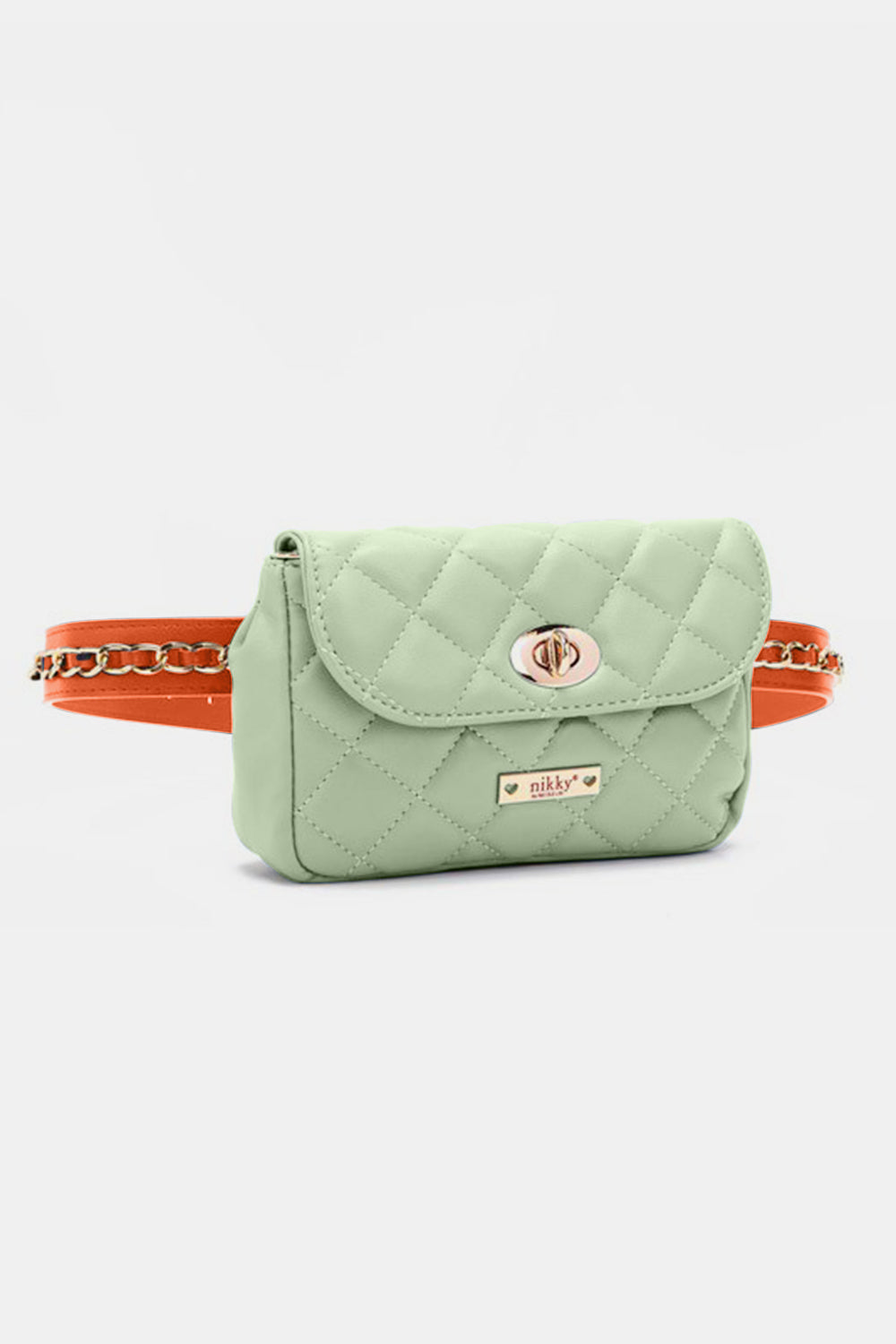 The Nicole Lee USA Quilted Fanny Pack is a light green, quilted crossbody bag crafted from vegan leather. It features gold hardware, including a twist-lock closure and a chain strap interwoven with orange leather accents. The brand name is visible on a gold plate at the front.