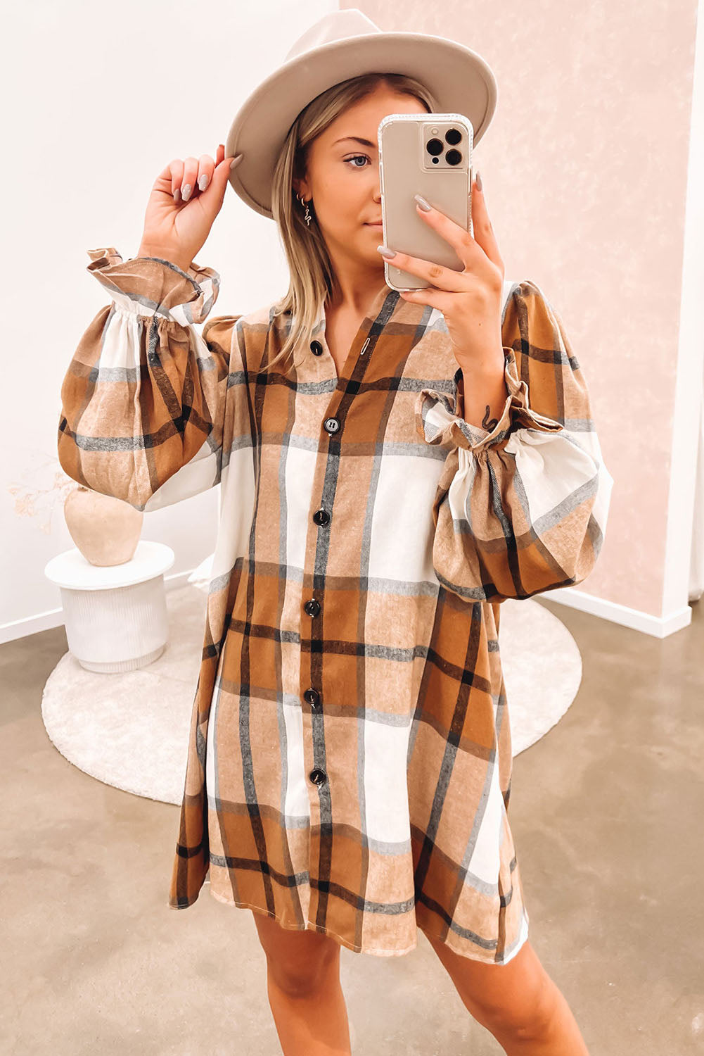 A woman wearing a Khaki Plaid Pattern Collared Neck Ruffled Sleeve Shirt Dress.
