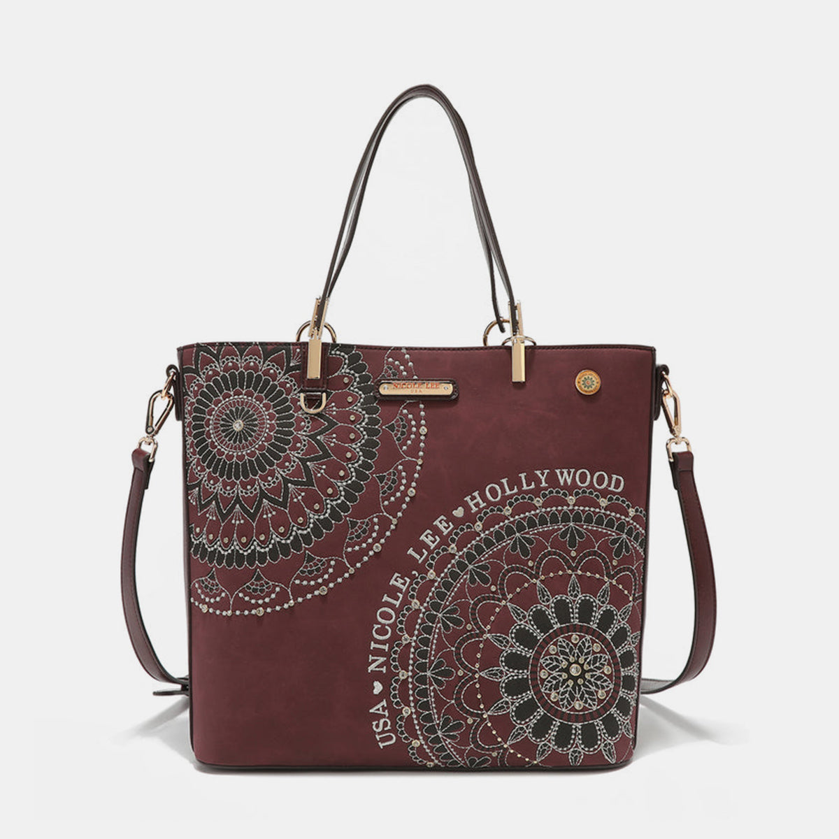 The Nicole Lee USA Metallic Stitching Embroidery Inlaid Rhinestone Tote Bag is a medium shopper in brown, crafted from vegan leather with intricate white mandala patterns and text that reads "USA Nicole Lee Hollywood." It features two shoulder straps, diamond rhinestones, and a decorative emblem on the front.