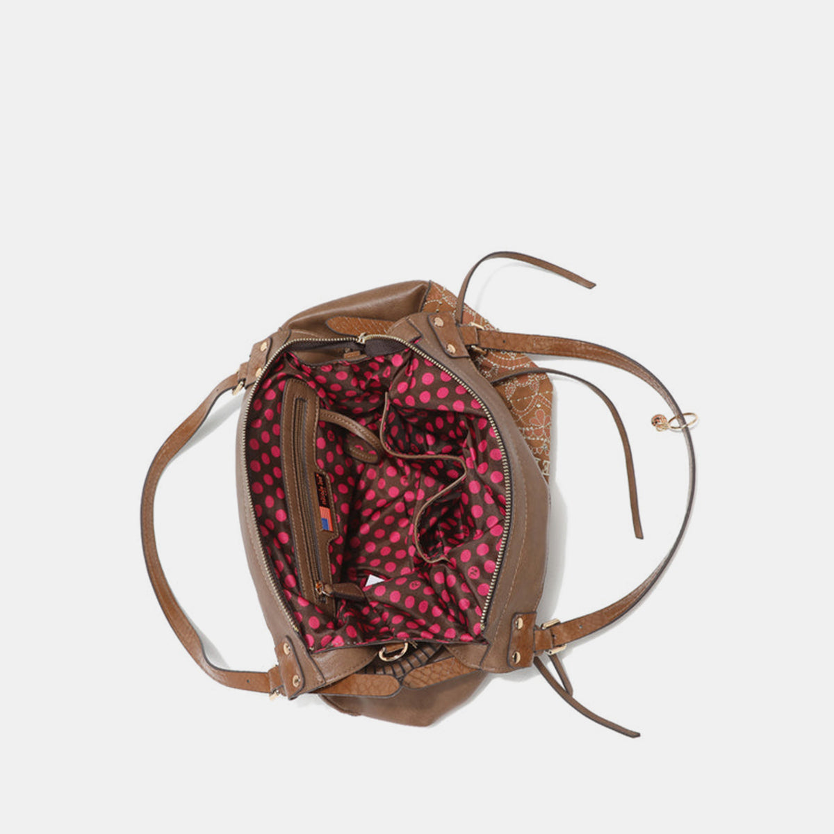 The Nicole Lee USA Side Braided Tassel Inlaid Rhinestone Embroidery Hobo Bag features intricately designed white mandala patterns on brown vegan leather, along with "Nicole Lee Hollywood USA" text. It includes top handles and decorative braided accents, as well as adjustable dual shoulder straps for added versatility.