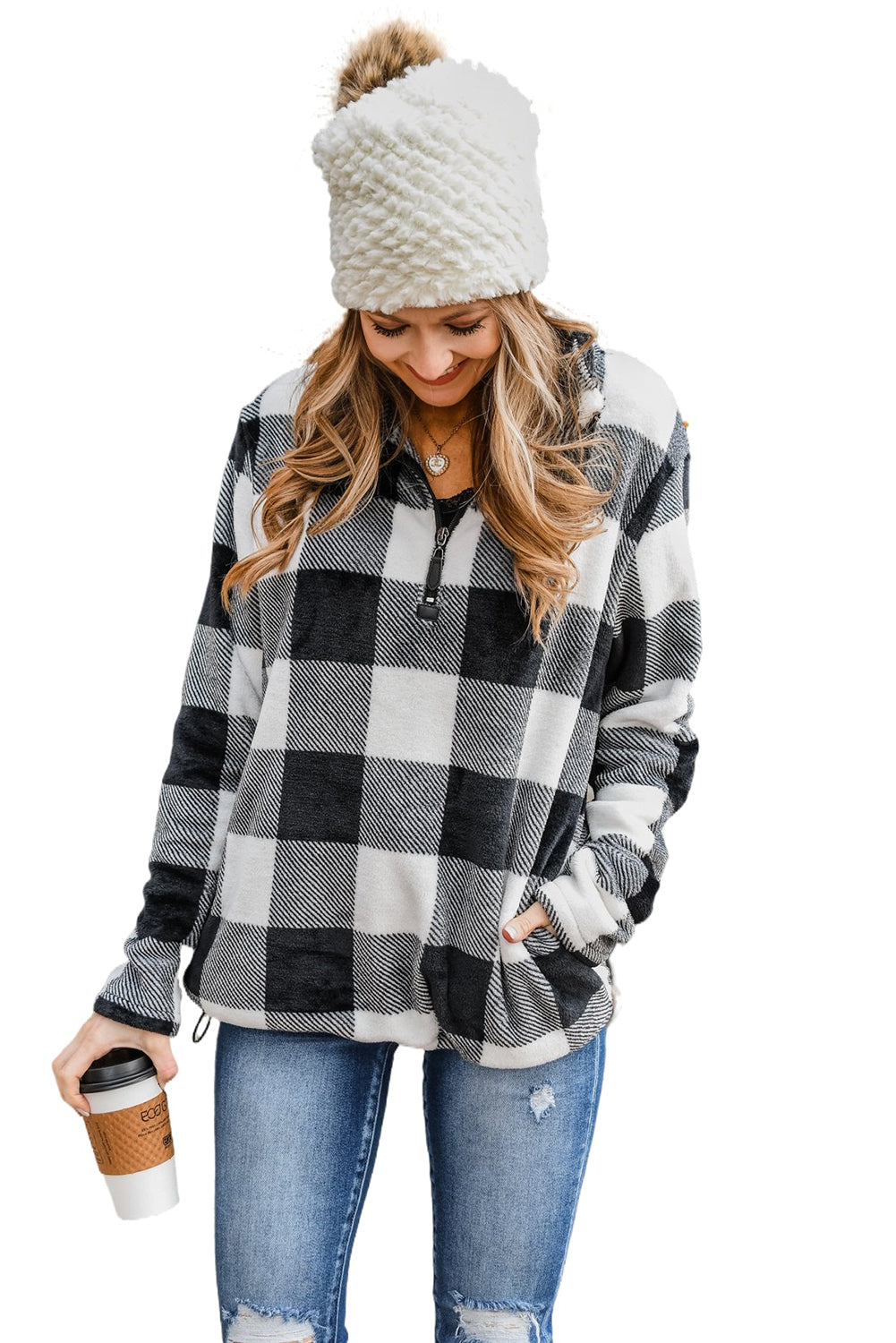 A woman with wavy hair is wearing a cozy Black Plaid Print 1/4 Zip Turn-down Collar Sweatshirt and blue jeans, standing with her back to the camera against a textured gray background.