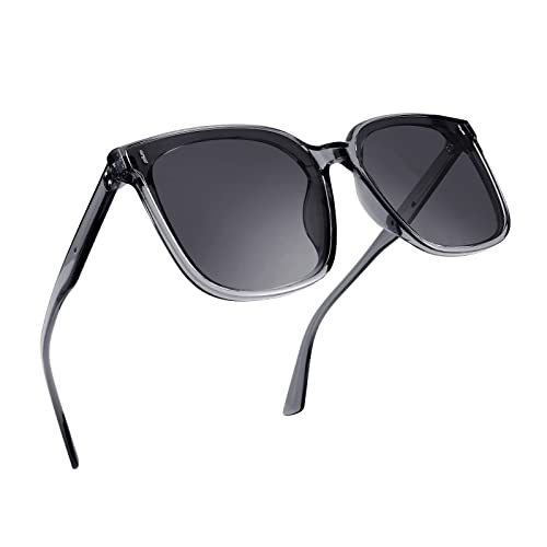 A pair of FEISEDY Women Oversized Vintage Polarized Sunglasses Square Cute Trendy Classic Simple Men B2758 with dark lenses and thin arms.