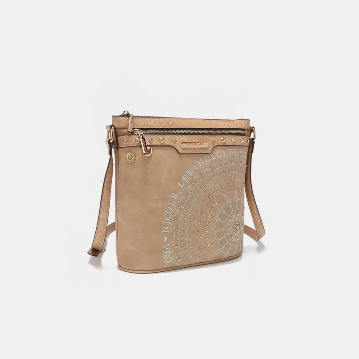 The Nicole Lee USA Metallic Stitching Embroidery Inlaid Rhinestone Crossbody Bag is a brown vegan leather accessory adorned with intricate white designs and text reading "Nicole Lee Hollywood USA" on the front. It features diamond rhinestones, multiple zippered compartments, and an adjustable strap.