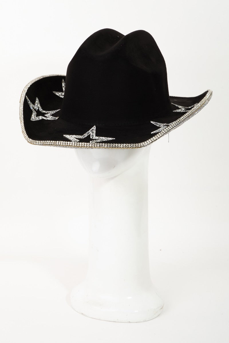 A person wearing the Fame Rhinestone Star Wide Brim Faux Suede Hat looks down against a plain white background.