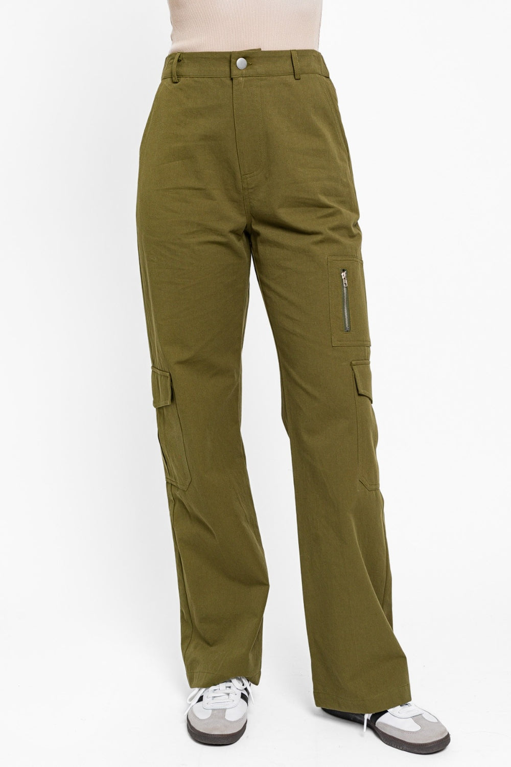   Person wearing the Le Lis High Waisted Wide Leg Cargo Pants with Pockets, featuring side pockets and zipper details, standing against a plain white background.