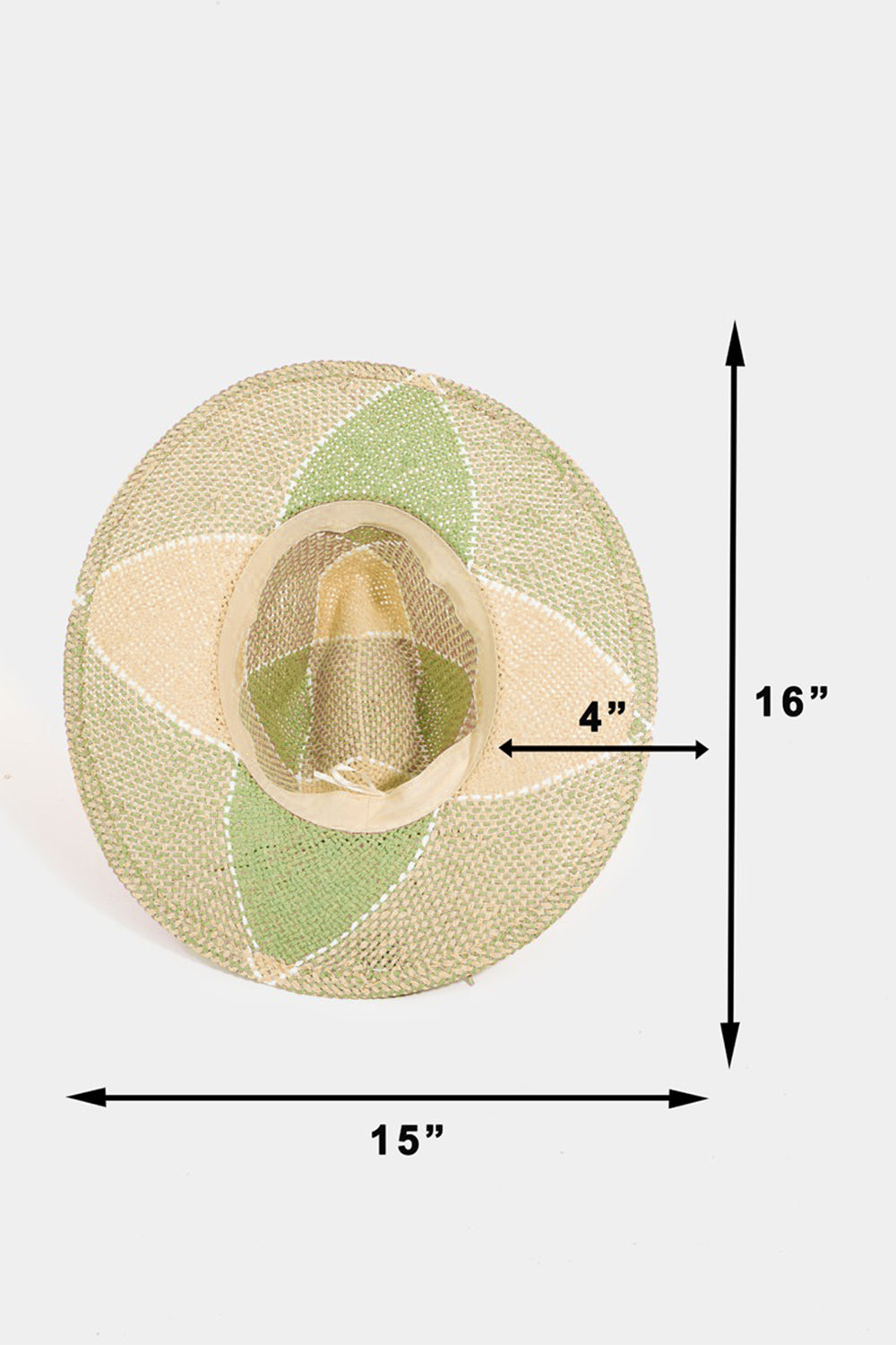 Introducing the Fame Contrast Straw Braid Hat—a wide-brimmed woven straw hat featuring a distinctive green and beige checkered pattern on a white background, designed to provide excellent sun protection.