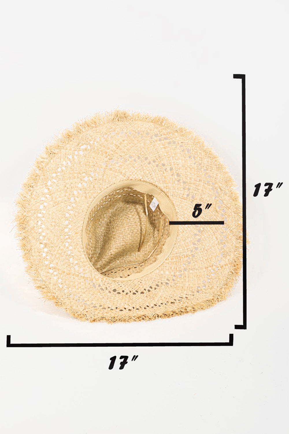 The Fame Openwork Raw Hem Weave Hat, with its wide brim and natural straw material featuring intricate openwork woven patterns, lies flat on a white background, making it the perfect chic summer accessory.