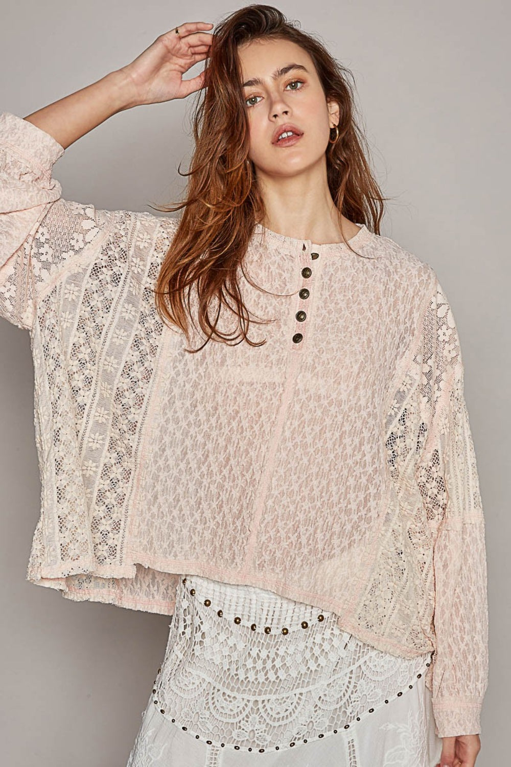 A person with long hair wearing the POL Round Neck Long Sleeve Raw Edge Lace Top and a matching white lace skirt poses against a plain background.