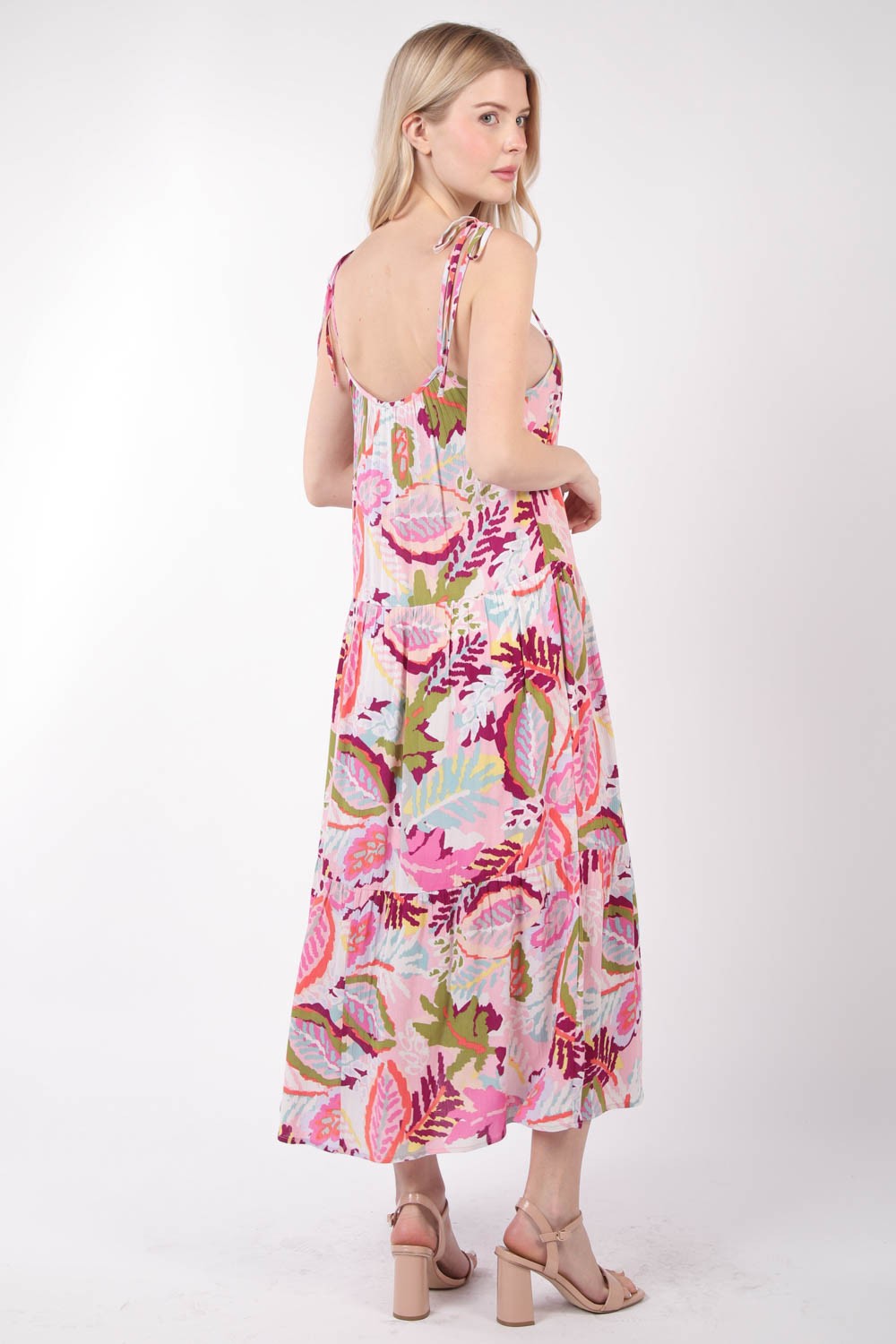 A person wearing the VERY J Tropical Printed Cami Midi Dress and strappy sandals stands against a plain background.