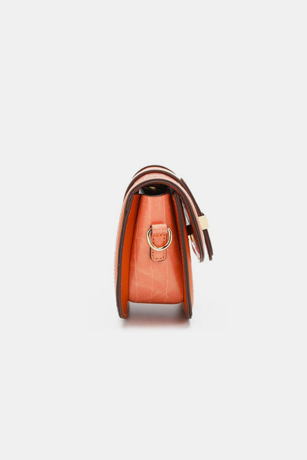 This stylish Nicole Lee USA croc embossed crossbody bag, crafted from eco-leather, features an orange hue, a gold buckle, and the brand name "nikky" on the front.