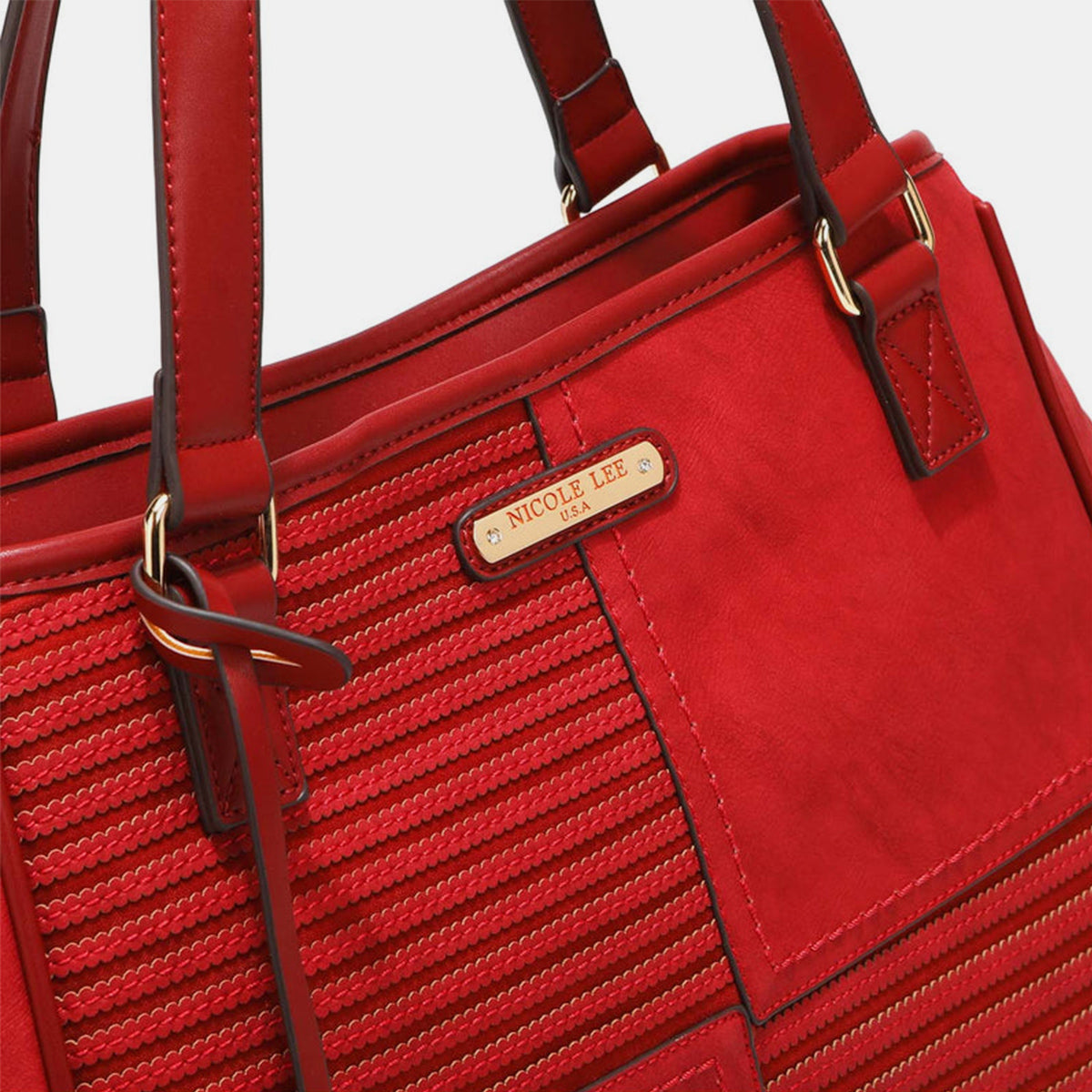 Nicole Lee USA's Scallop Stitched Tote Bag in red is made from vegan leather, showcasing textured stripes and scallop-stitched details, and includes a gold circular charm on one handle.