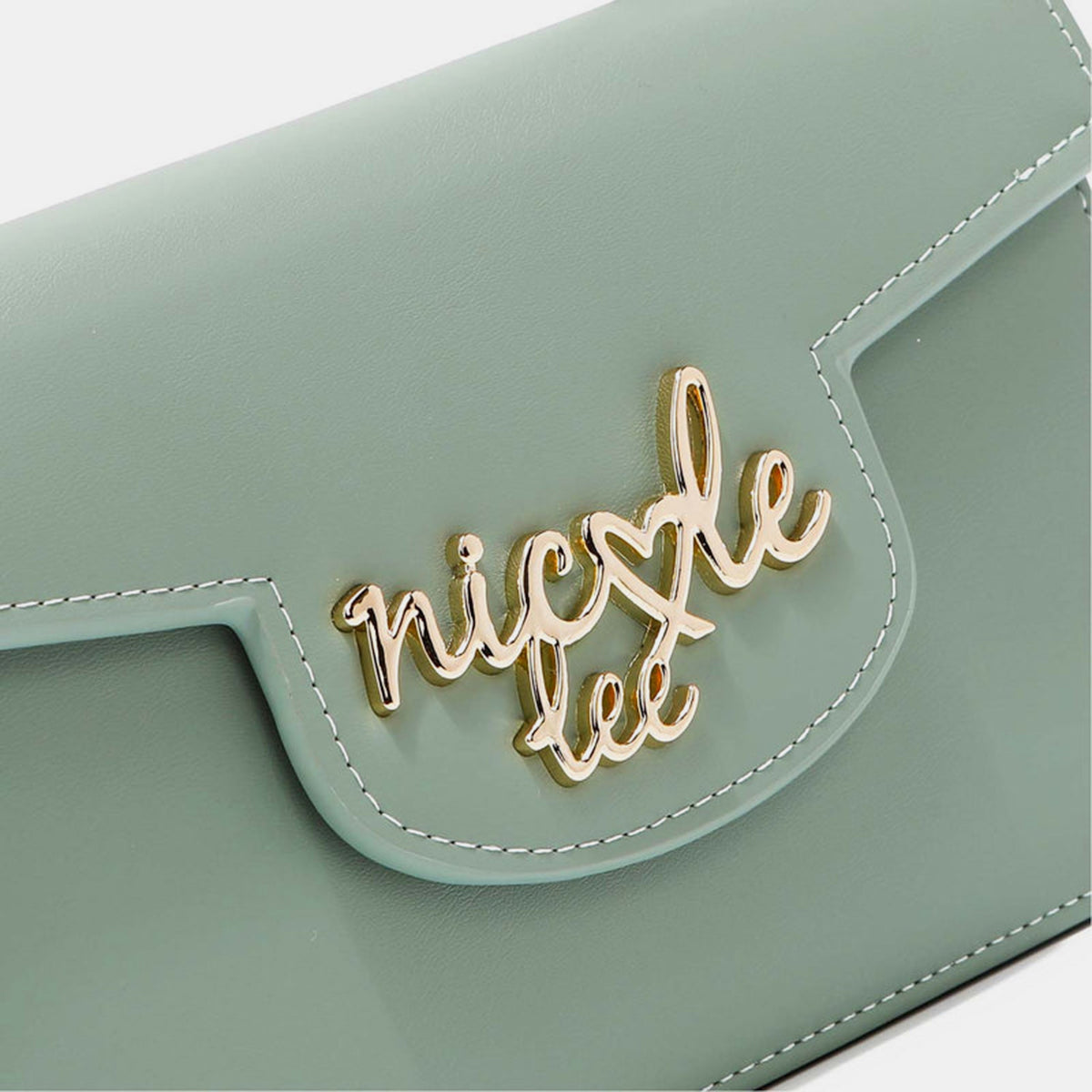 The Nicole Lee USA Small Crossbody Wallet in bright yellow features a handle and flap closure, accented with "nicole lee" in metallic letters on the front. It also includes an adjustable crossbody strap for versatile wear.