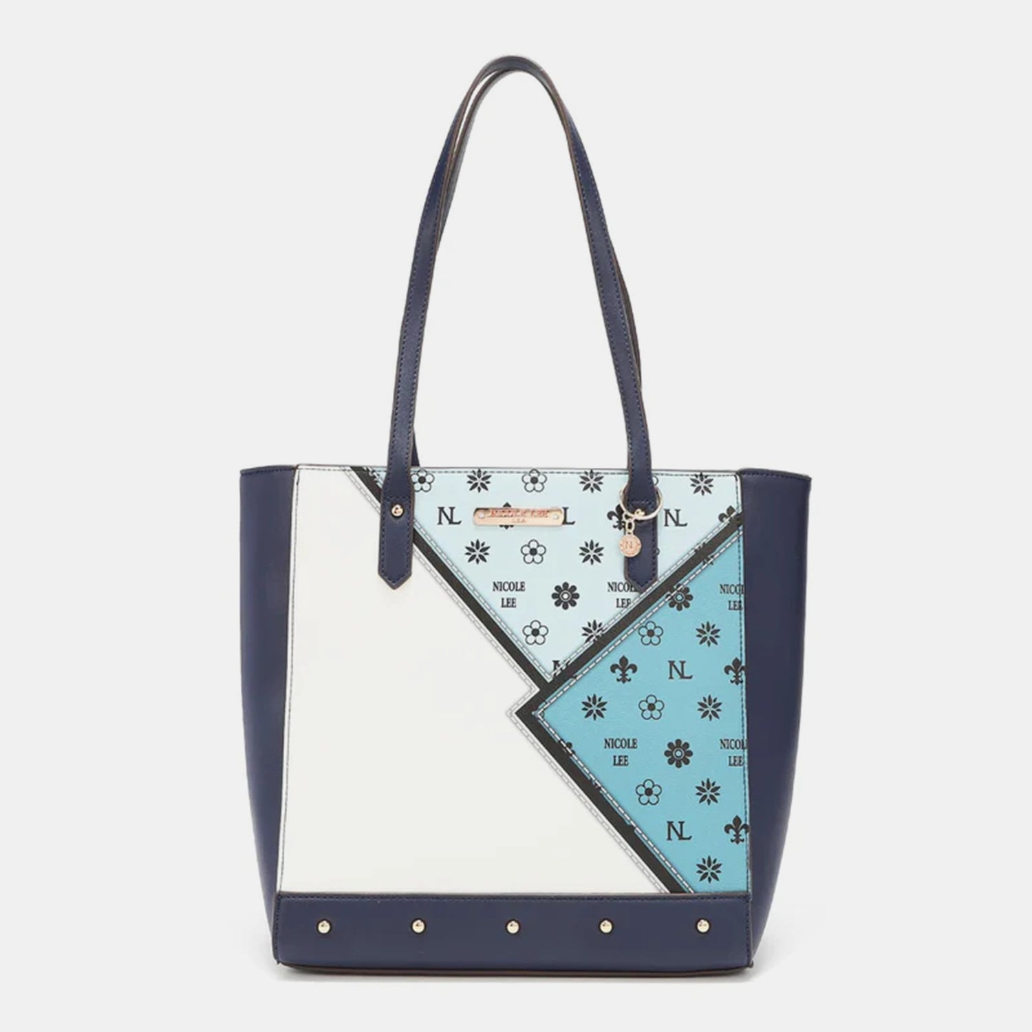 The Nicole Lee USA 3-Piece Color Block Handbag Set is a stylish collection that includes three blue and white vegan leather bags with black straps: a versatile tote bag, a chic small handbag, and an elegant round wristlet with a strap.