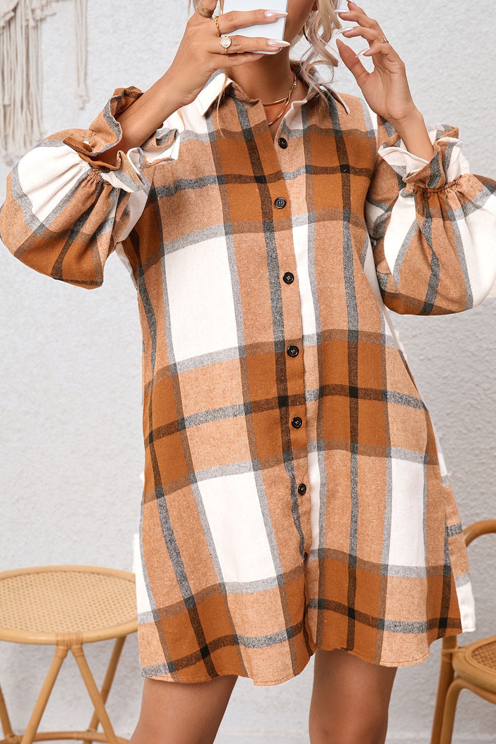 A woman wearing a Khaki Plaid Pattern Collared Neck Ruffled Sleeve Shirt Dress.