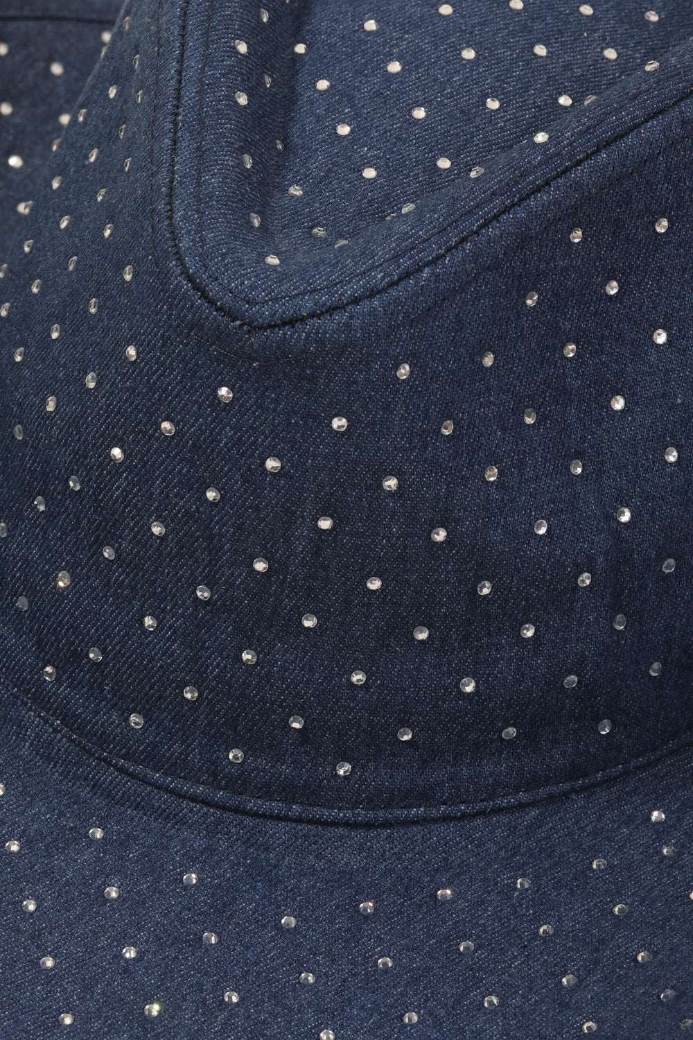 The Fame Rhinestone Wide Brim Denim Hat features a navy-blue design adorned with silver rhinestone embellishments on a white background.