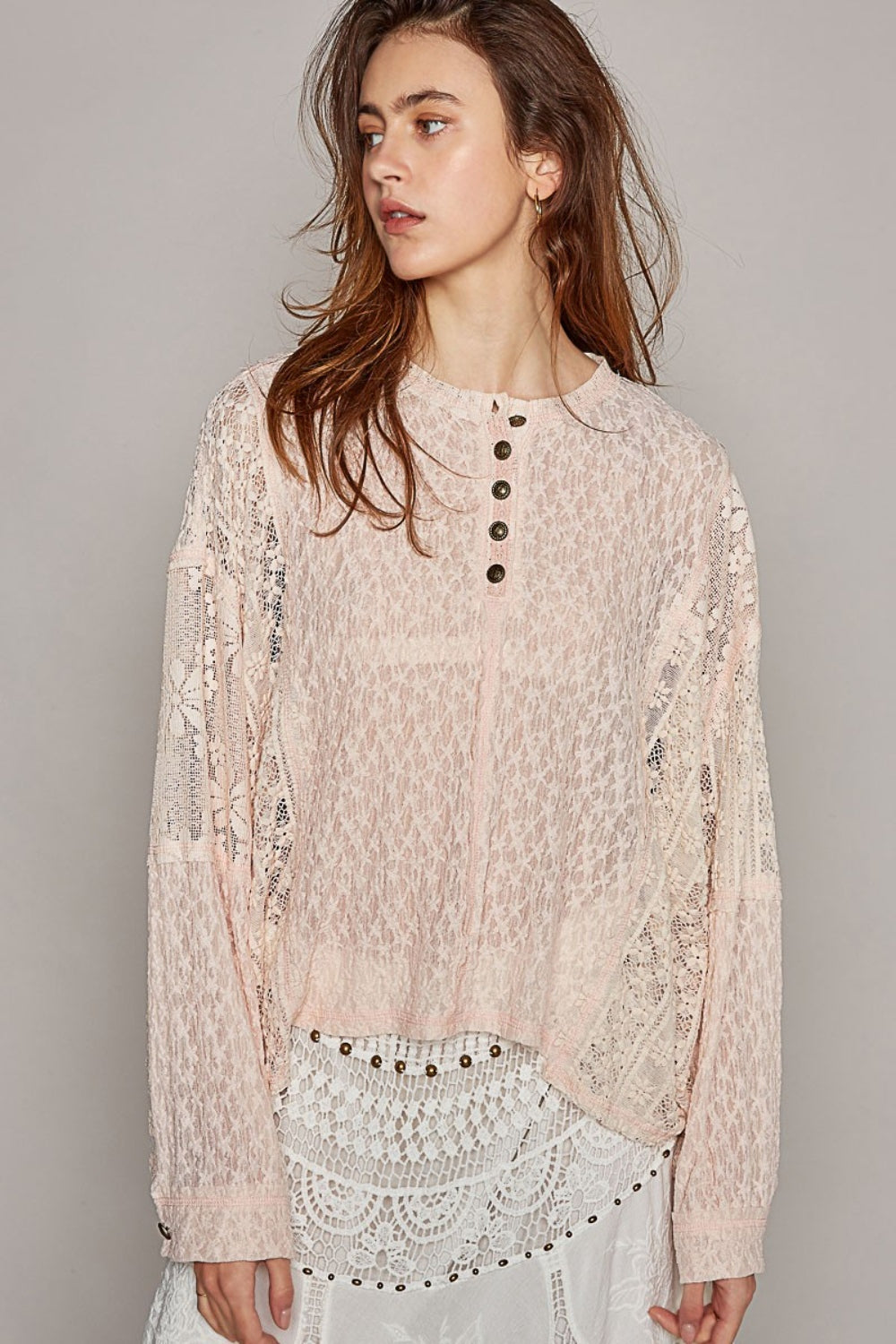 A person with long hair wearing the POL Round Neck Long Sleeve Raw Edge Lace Top and a matching white lace skirt poses against a plain background.