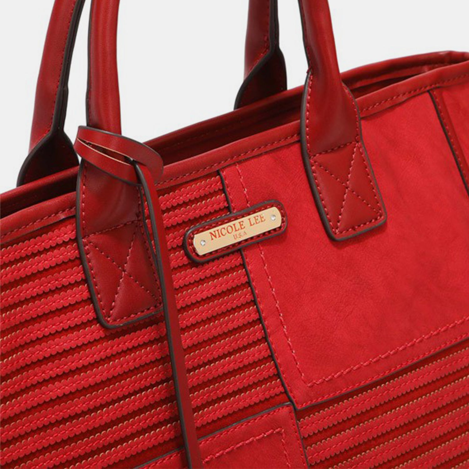 The Nicole Lee USA Scallop Stitched Handbag is crafted from vegan leather in a striking red color, featuring a textured front and elegant gold accents. It includes scallop-stitched details, two handles, and an adjustable shoulder strap for versatile carrying options.