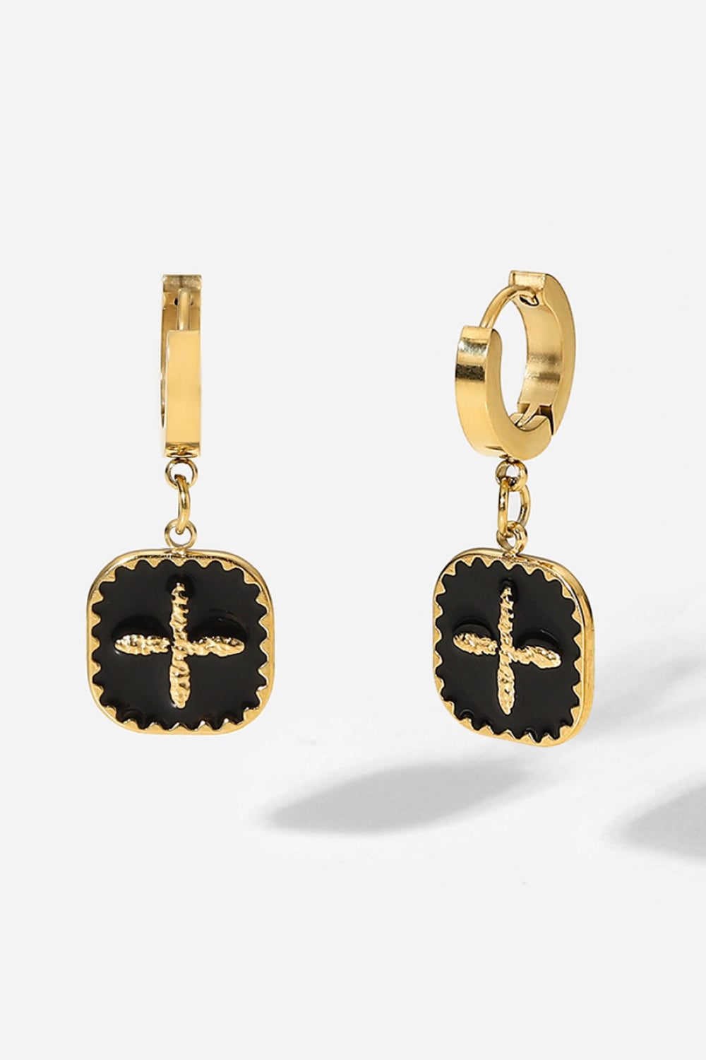 The Plus Sign Square Shape Drop Earrings are a pair of gold hoop earrings featuring square black pendants with a stylish gold plus sign design in the center, crafted from durable stainless steel jewelry.