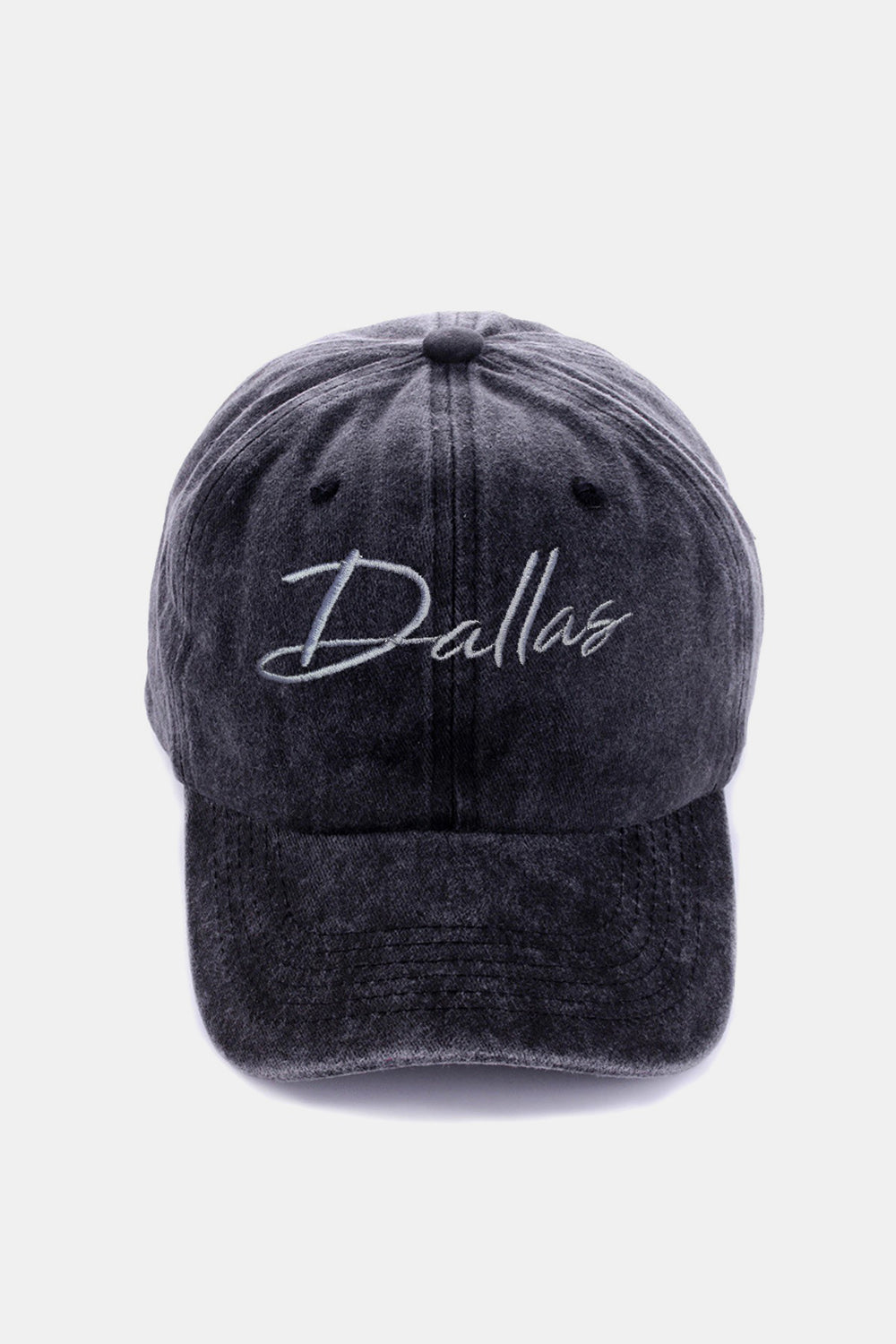 The Zenana Washed DALLAS Embroidered Baseball Cap is a black vintage-style cap featuring the word "Dallas" embroidered in white cursive font on the front, made from 100% cotton.