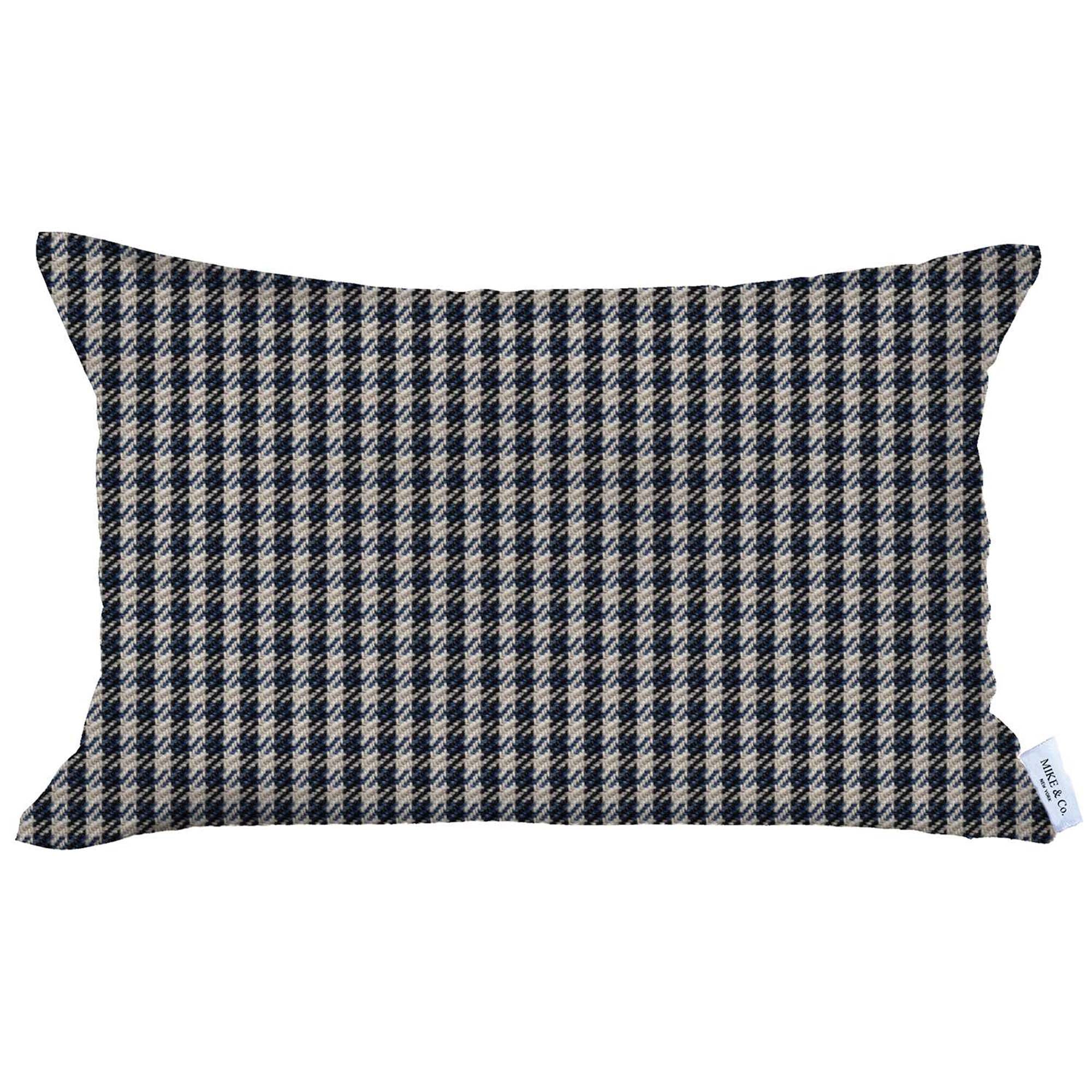 The Bohemian Handmade Decorative Throw Pillow, featuring a houndstooth jacquard design and crafted to OEKO-TEX Standard 100, adds charm to the brown sofa beside a magazine rack.