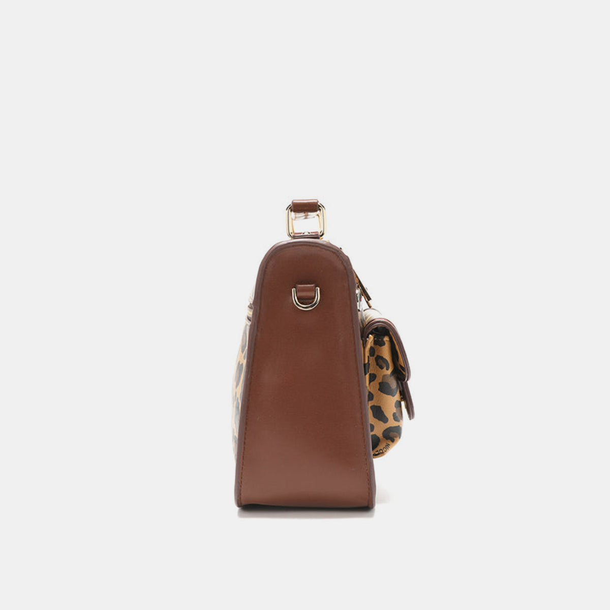 The Nicole Lee USA Leopard Top Handle Handbag is a stylish accessory with chic leopard print and brown vegan leather accents. It boasts two outer pockets, a gold-tone zip closure, and includes a versatile crossbody strap for convenient carrying.