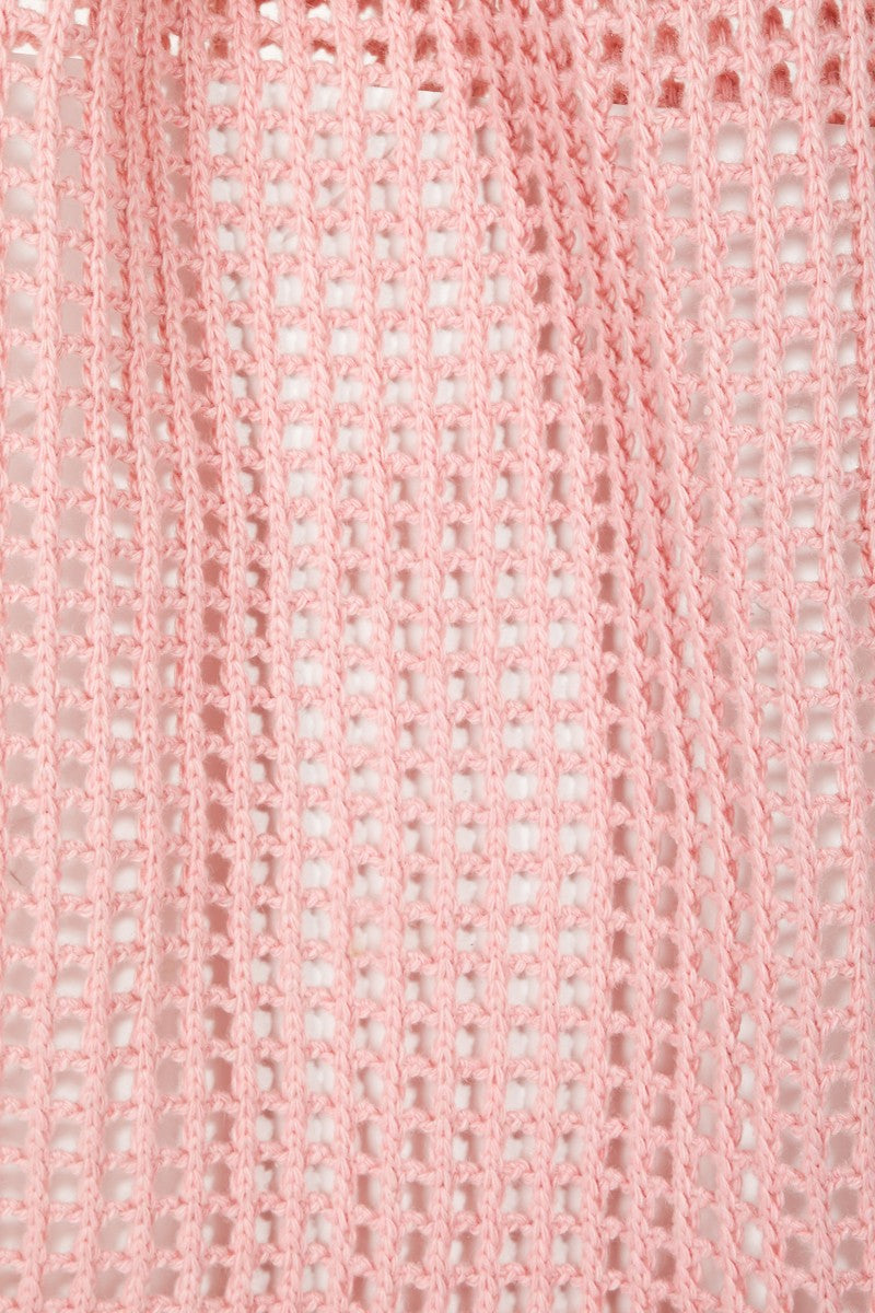 The Fame Pointelle Knit Crochet Tote Bag, available in a trendy light pink color, boasts a stylish open mesh pattern and two parallel shoulder straps, making it the perfect accessory for modern fashion.