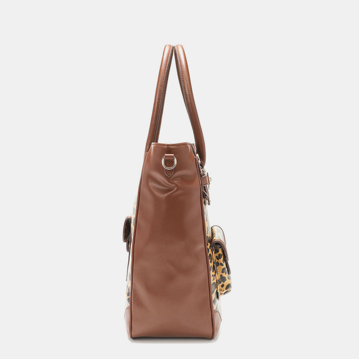 The Nicole Lee USA Leopard Large Tote Bag is a chic leopard print handbag made from vegan leather, featuring two handles, multiple pockets, a buckle, and zipper details.