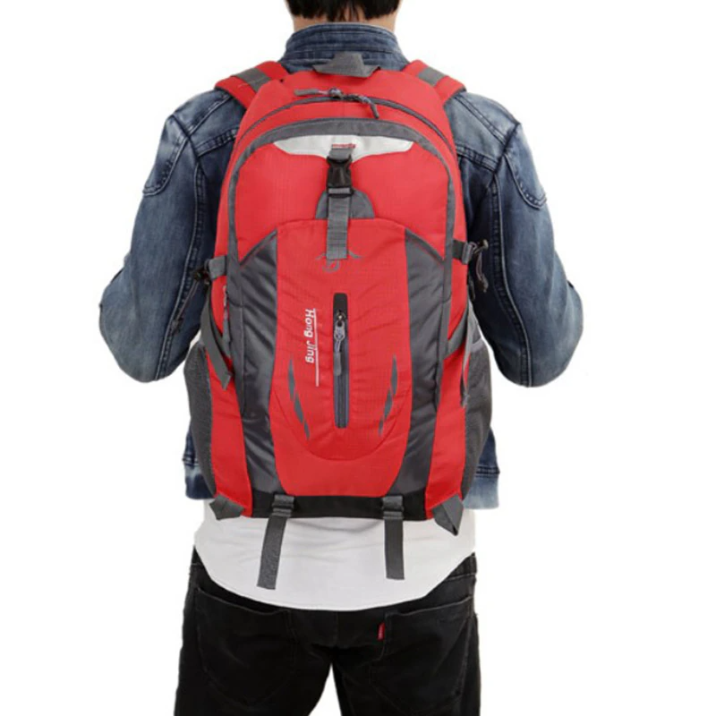 Displayed next to a USA flag with the text "US Seller Fast Shipping From USA," five 40L Travel Backpacks in green, gray, red, blue, and orange are showcased. Perfect for organizing your essentials, these versatile bags are as practical as a calendar widget on a busy day.