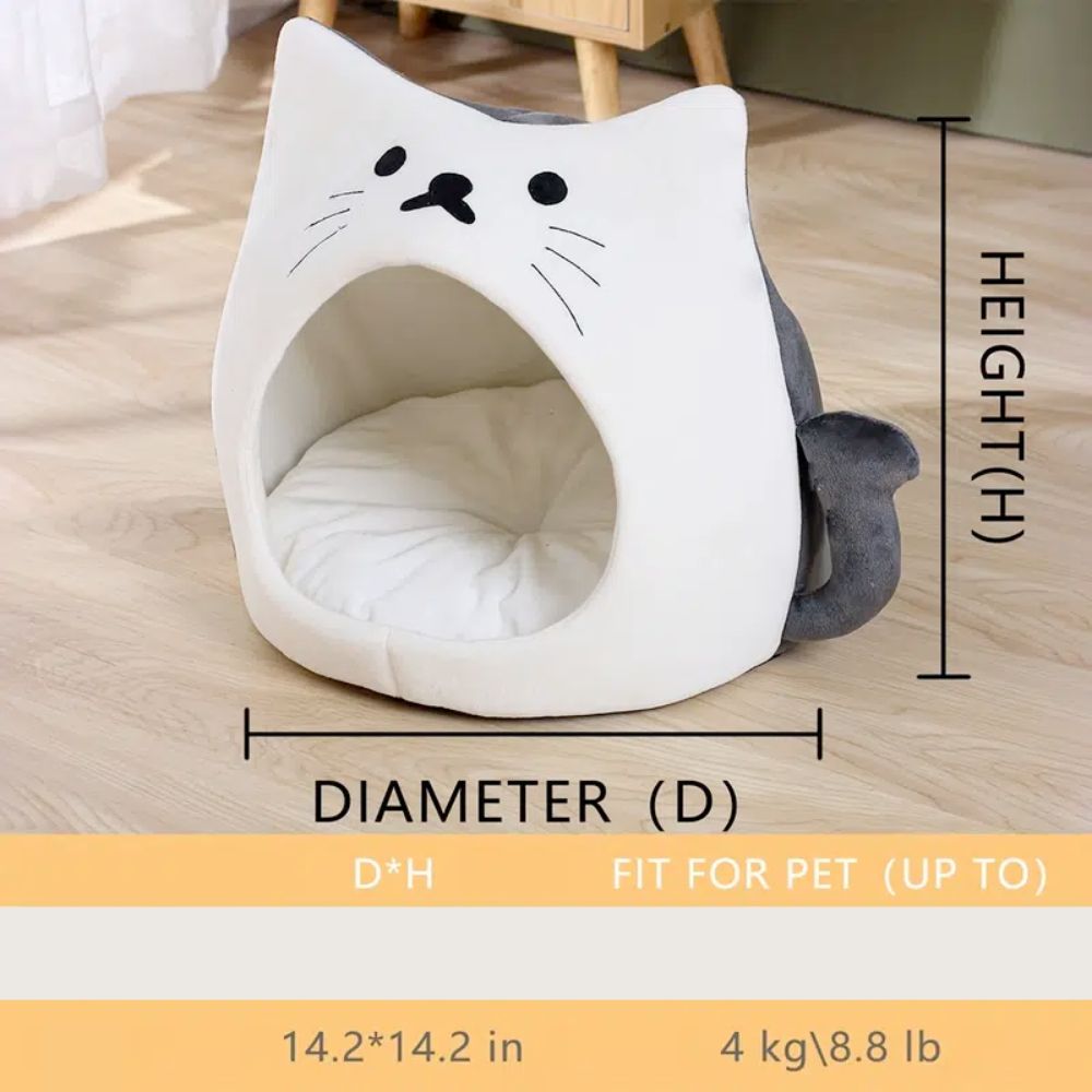 An Adorable Cat Shape Pet House nestled in a cozy pet house designed like a cat shape bed, enjoying the soft spot.